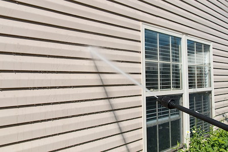 How Professional House Washing Protects Paint, Caulk, and Siding